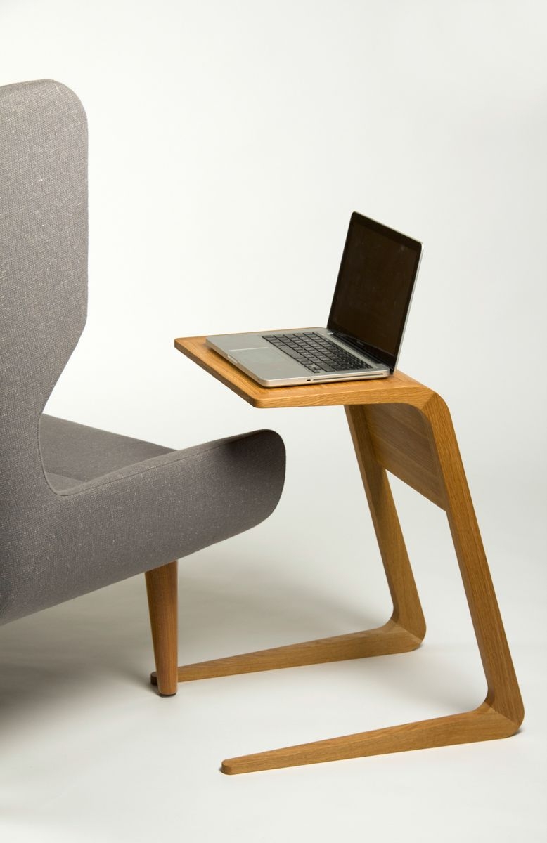 Riley is a solid wood pull up table designed by