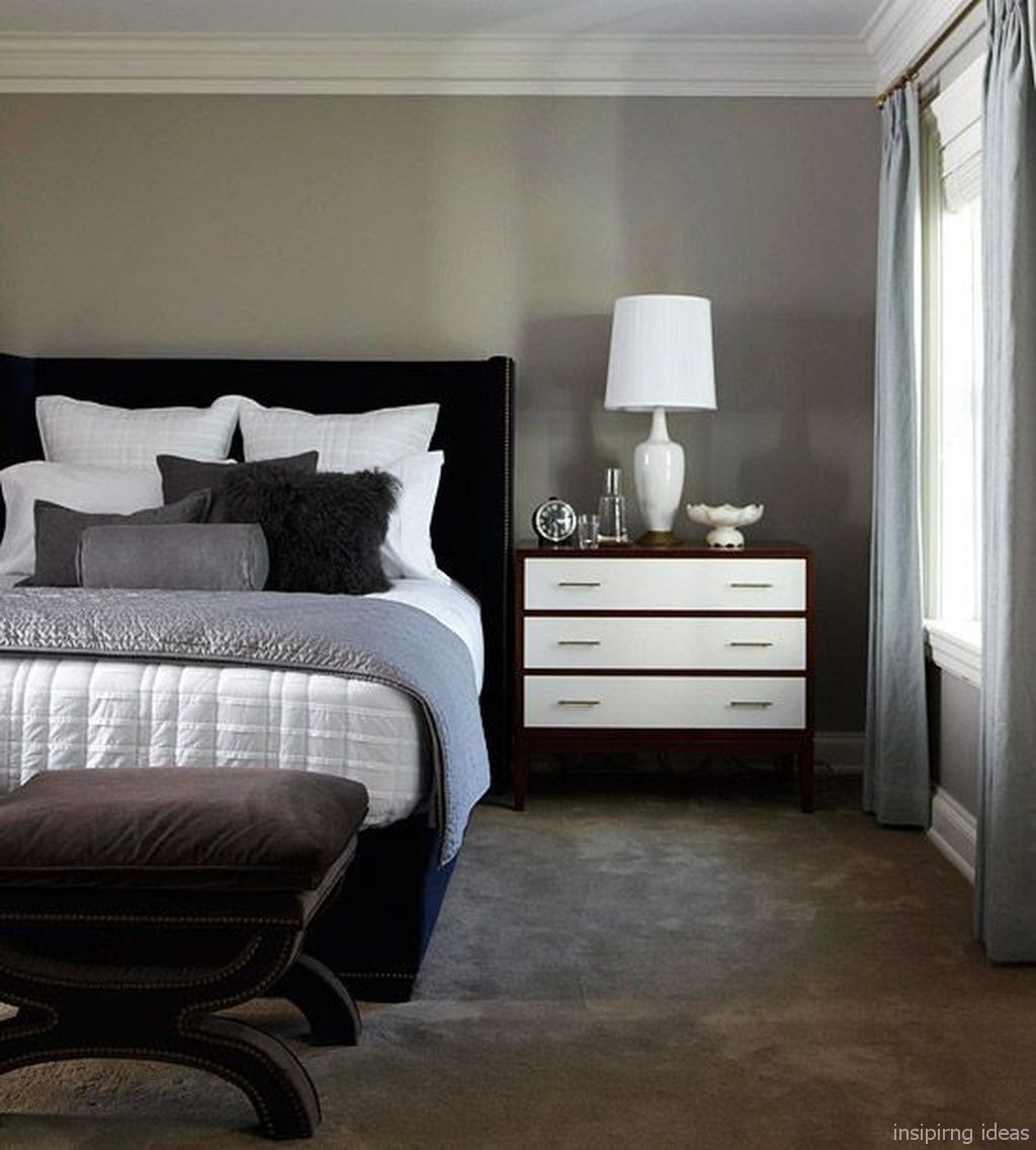 Blue walls and brown furniture