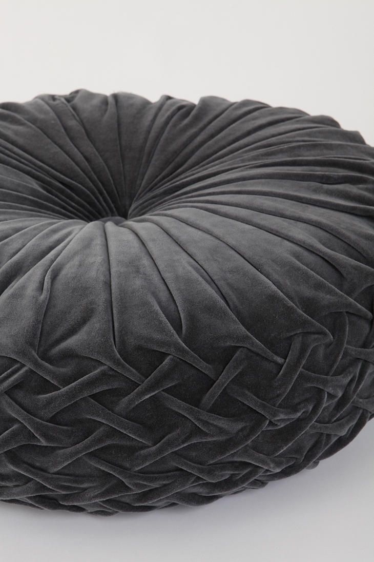 Round velvet ottoman