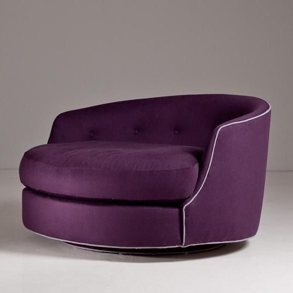 A large milo baughman designed circular swivel love chair 1970s