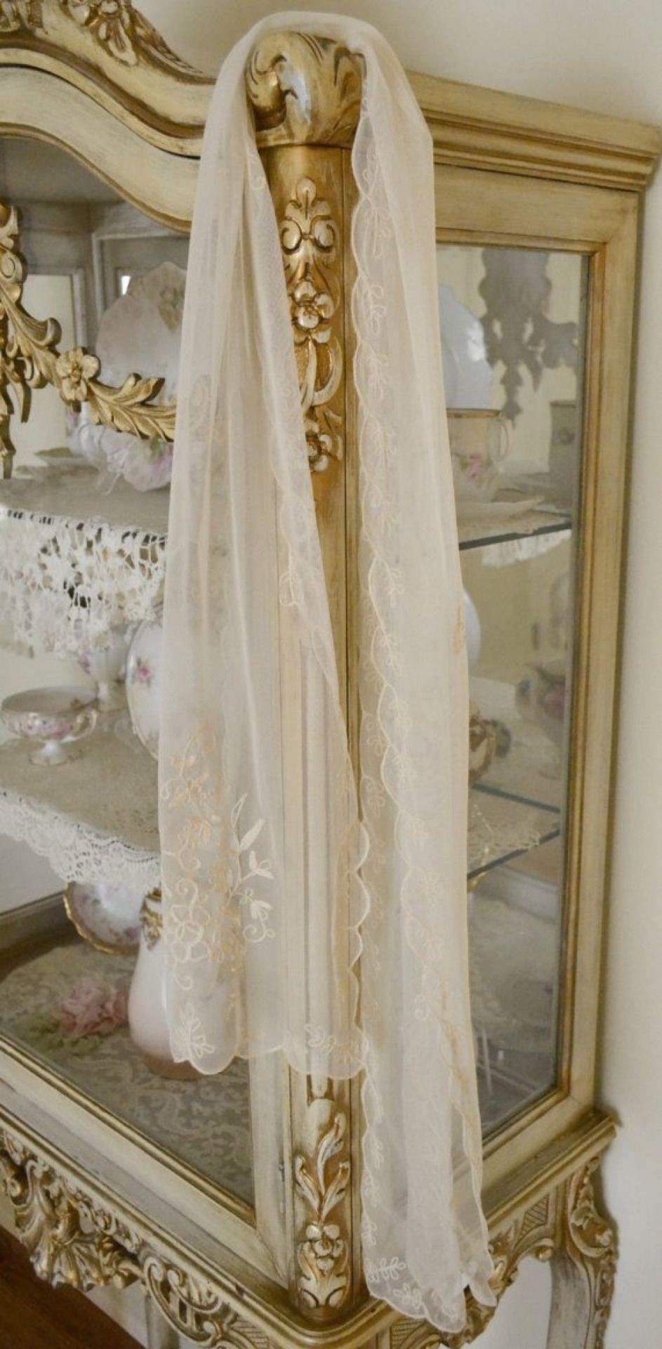 Gold curio cabinets 2