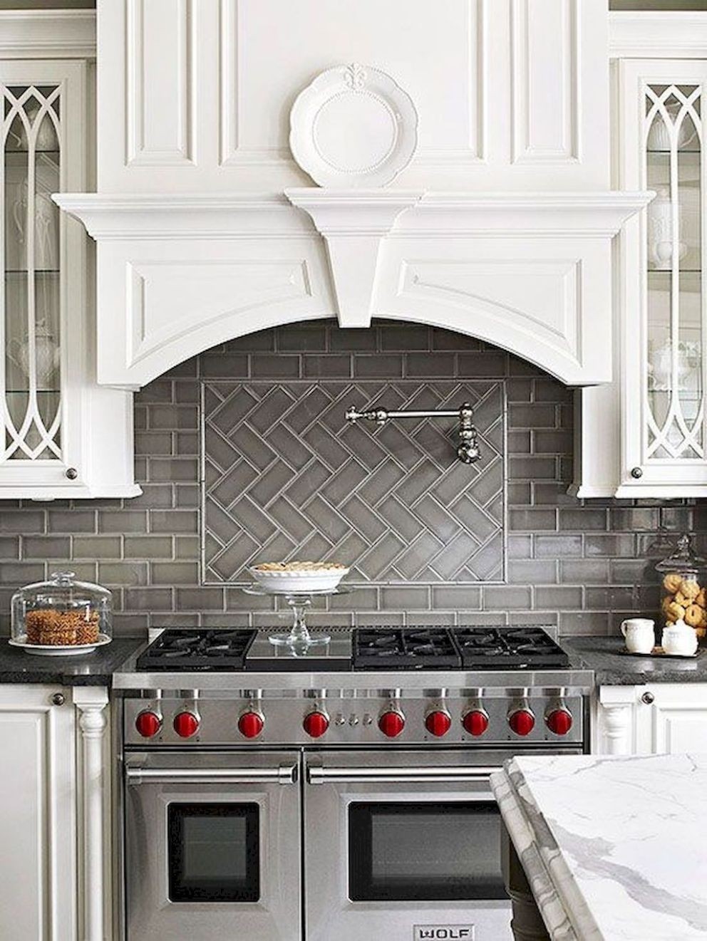 Try a herringbone pattern with your subway tile more backsplash