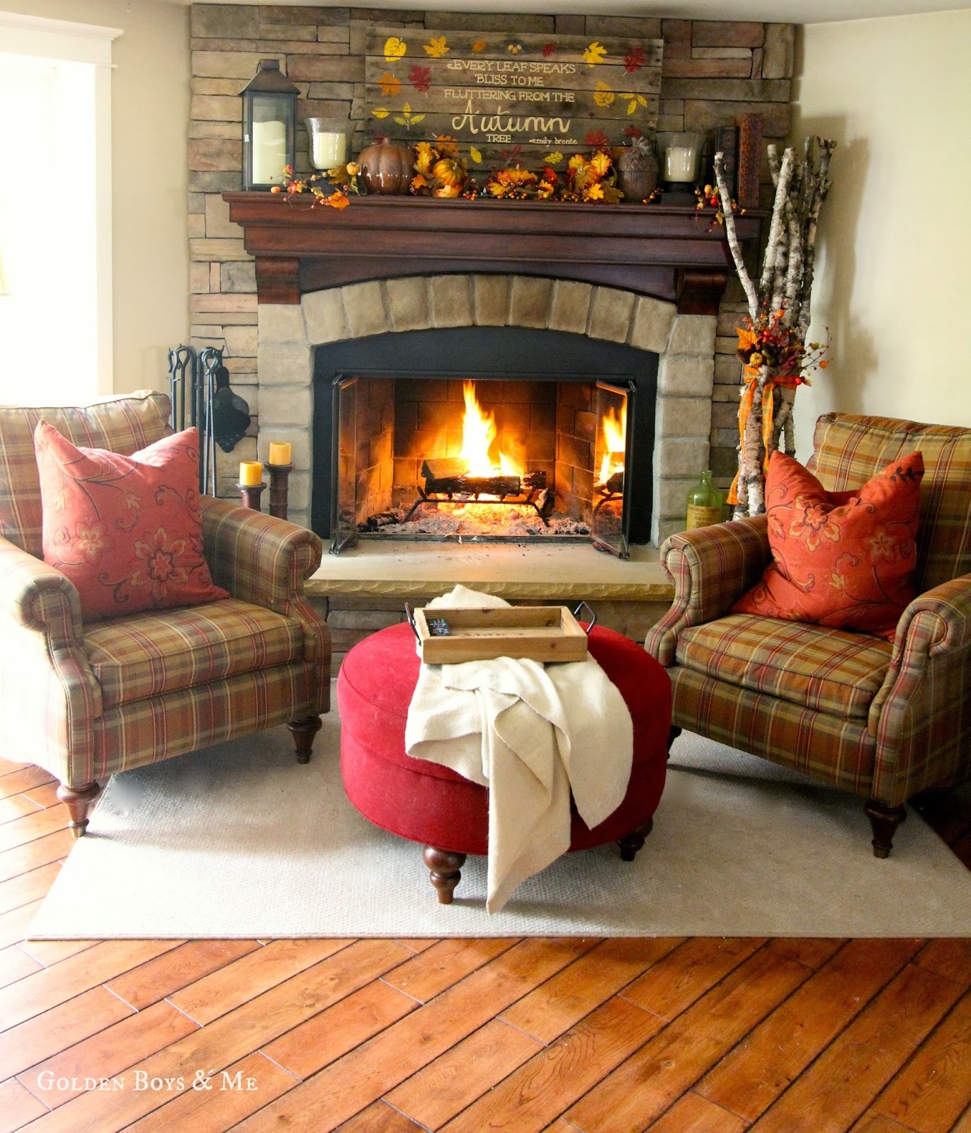 Cozy Autumn Living Room with Fireplace and Plaid Chairs
