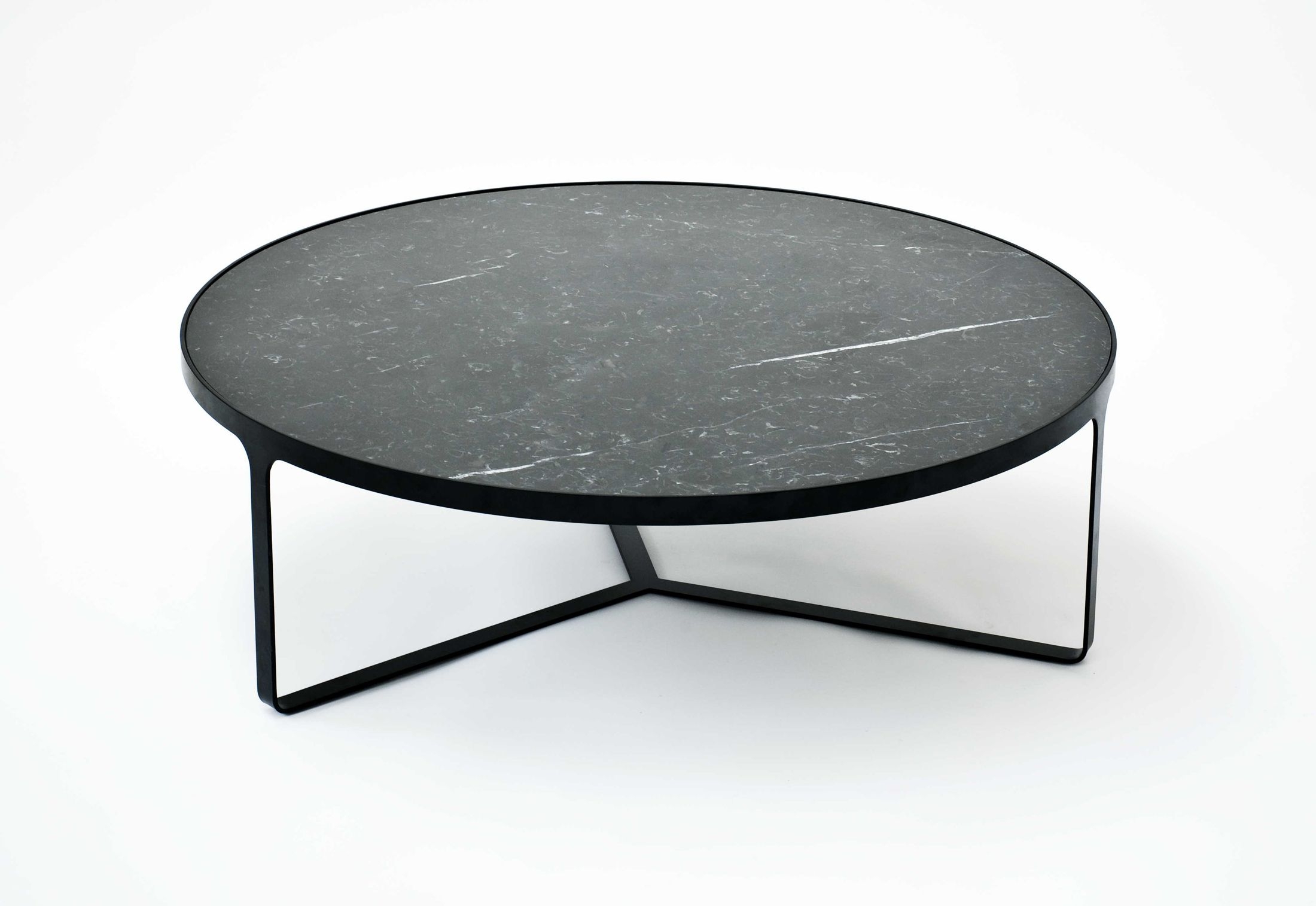 Round stone top coffee table