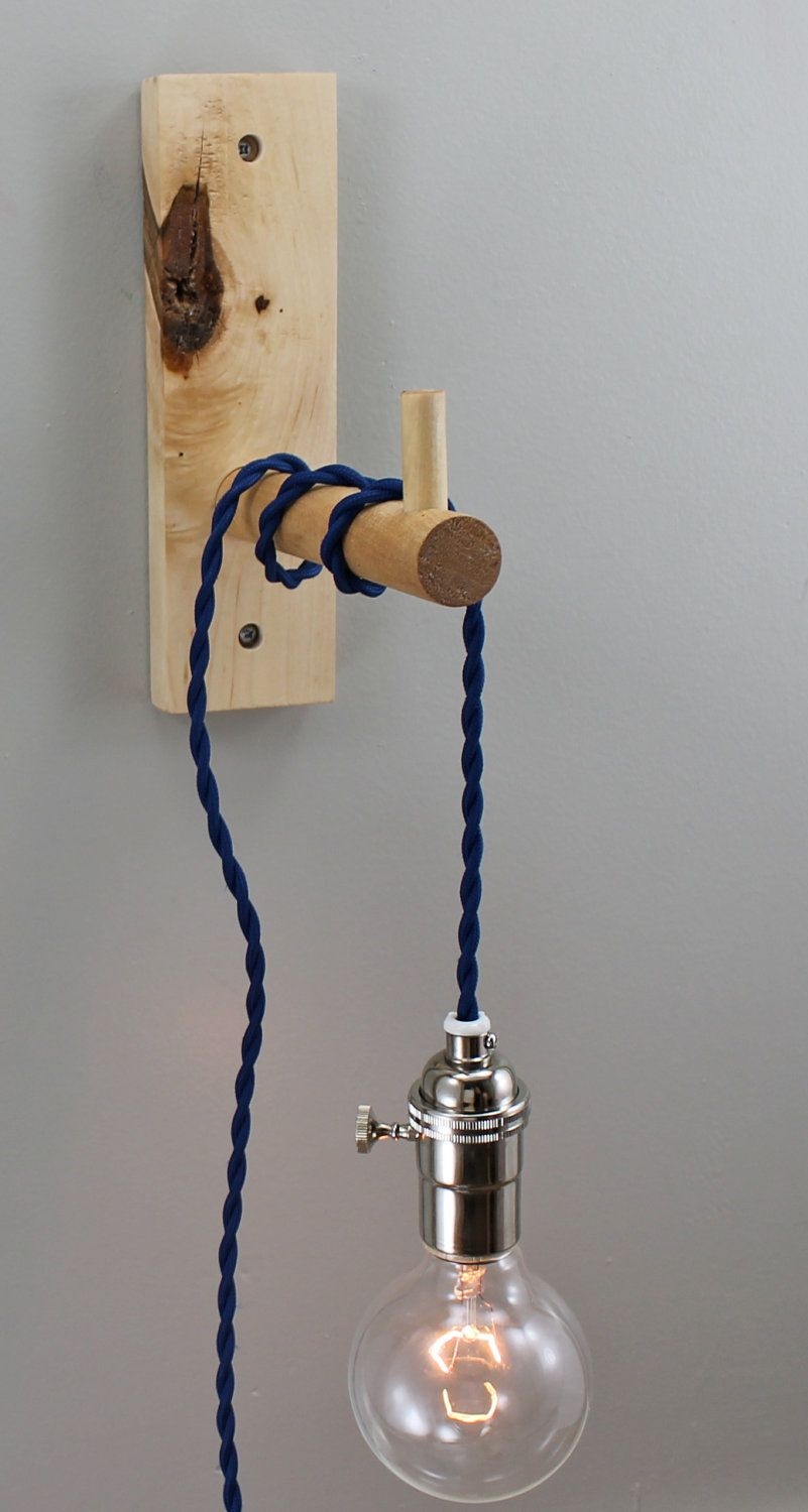 The perch modern wood wall sconce in