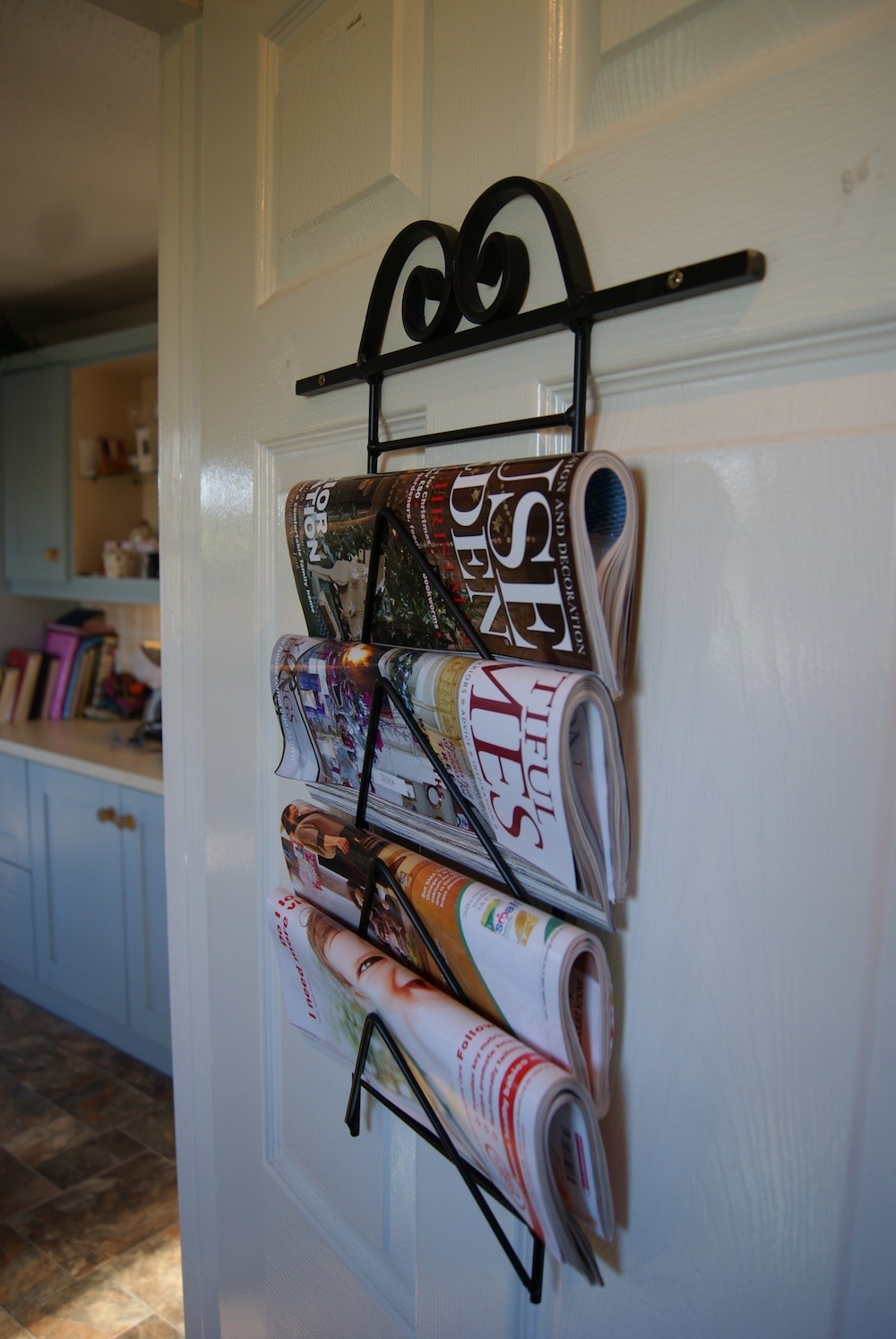 Newspaper rack wall mounted