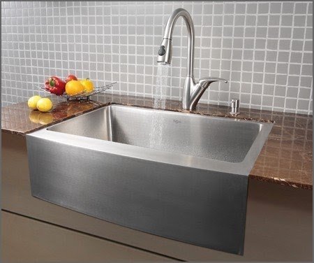 Apron front sink with backsplash
