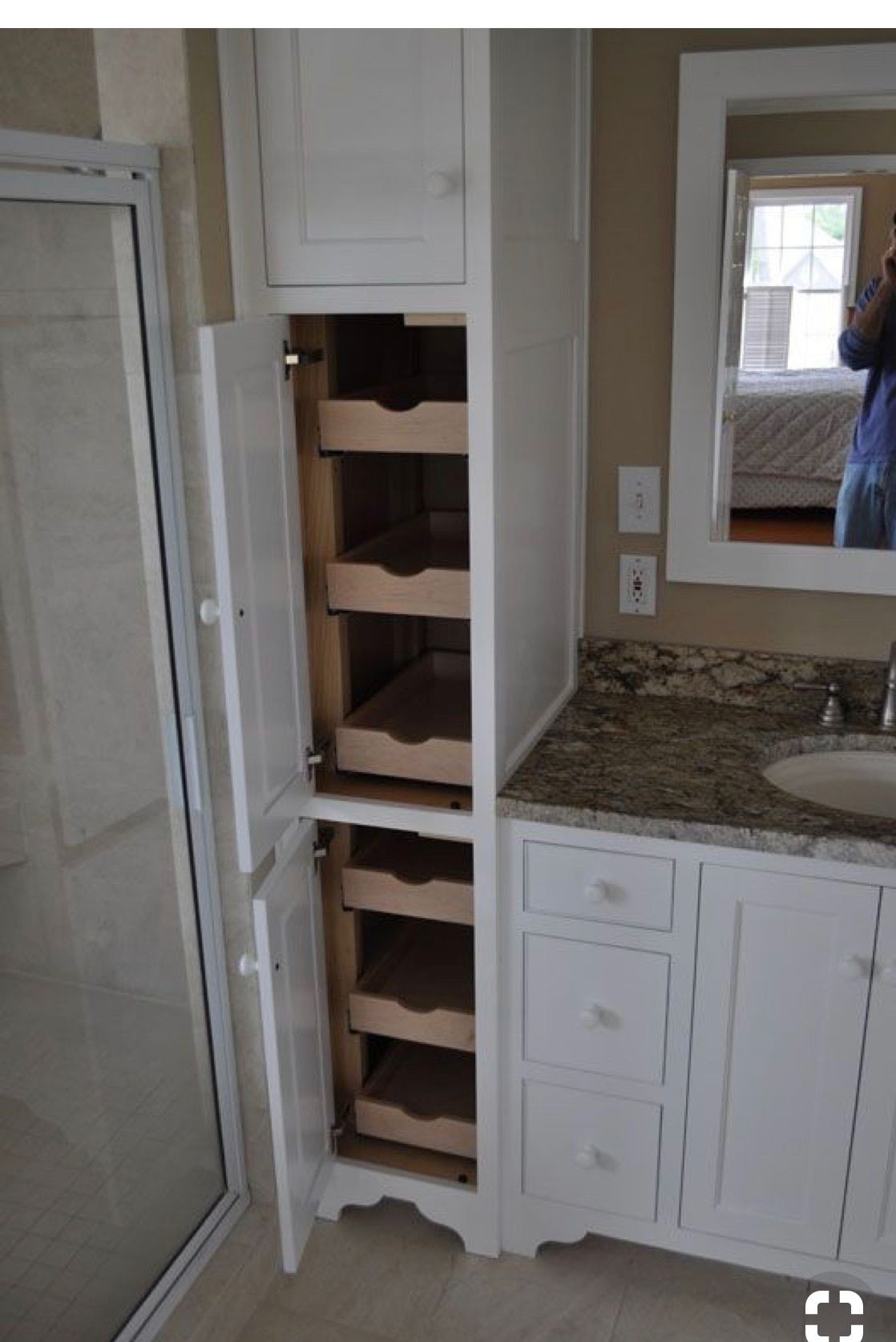 Bathroom cabinet with built in laundry hamper