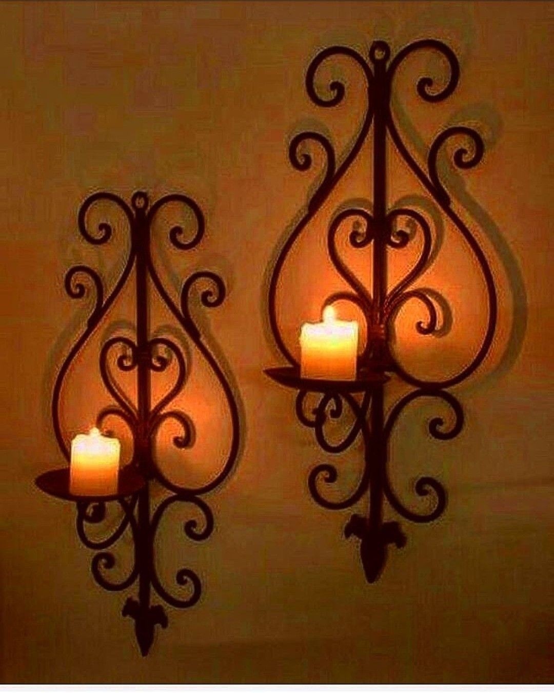 Black wrought iron candlesticks