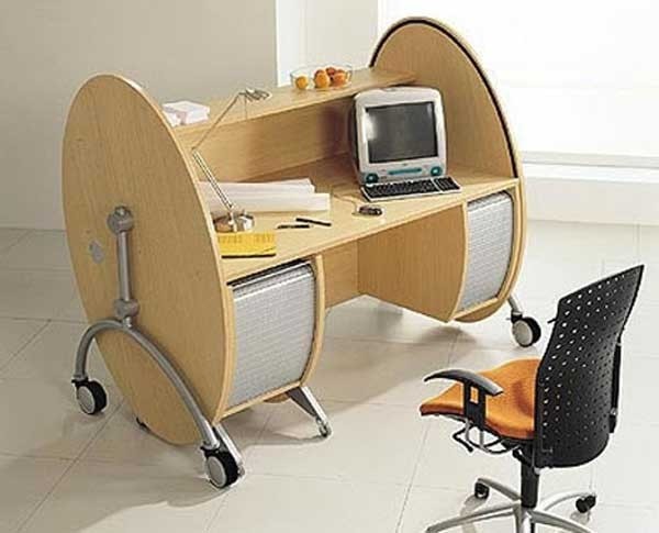 Roll away computer desk