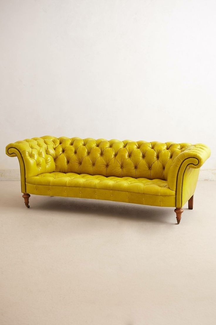 Yellow tufted sofa 2