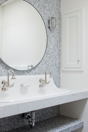A feature wall of tile around sink area cool idea