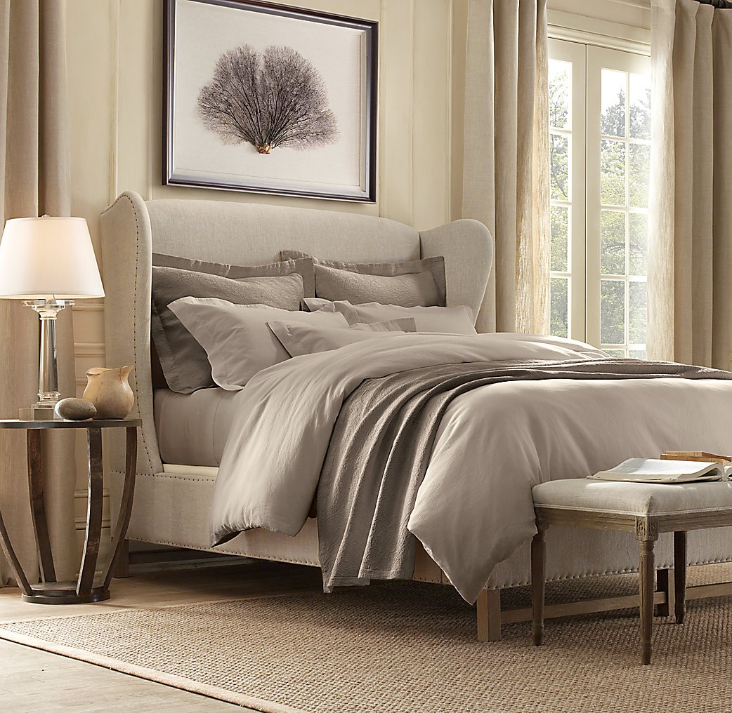 Wingback upholstered king bed