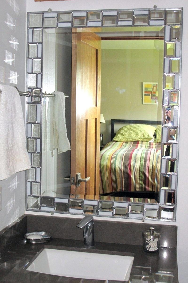 Mirror with mosaic tile border