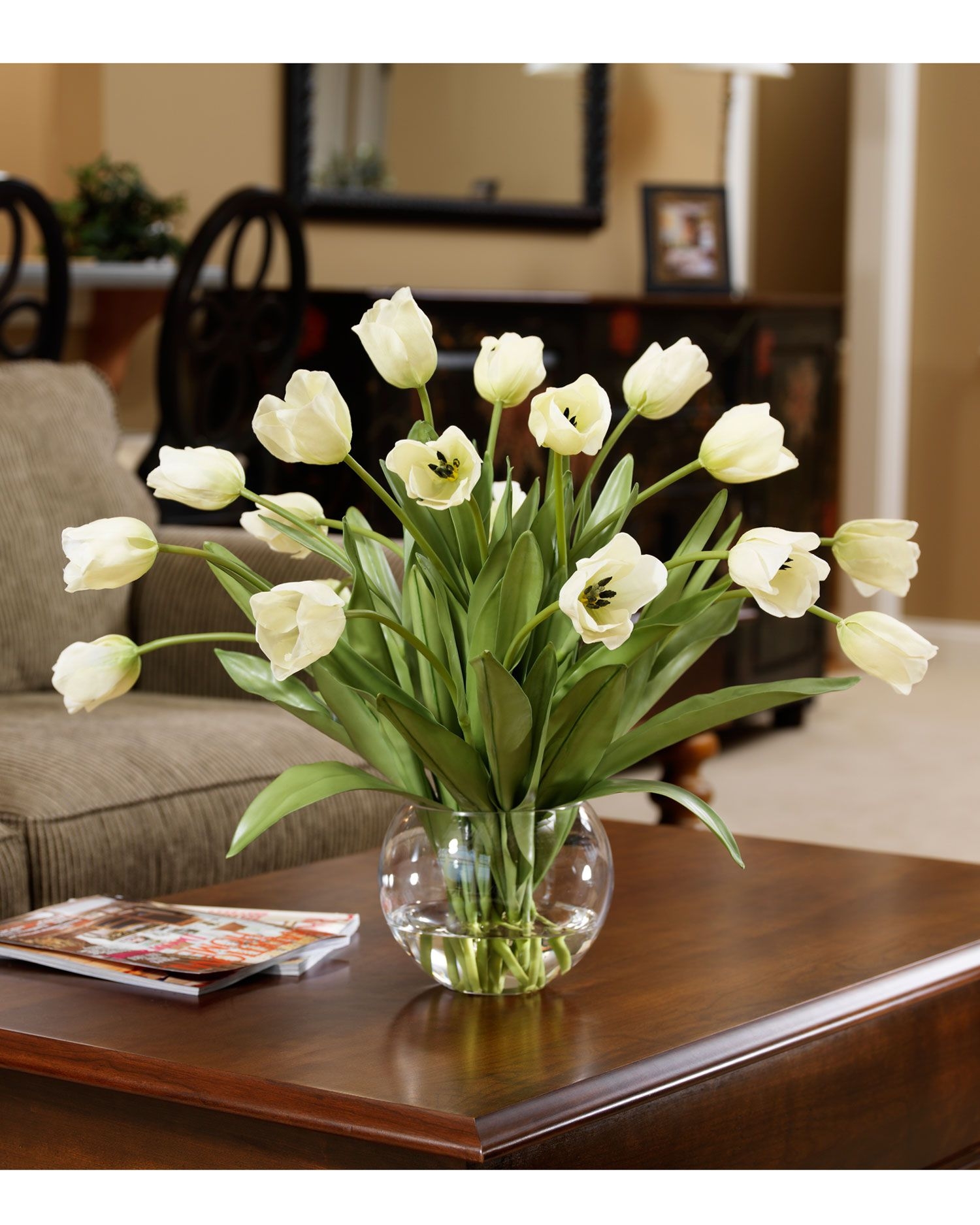 Large artificial flowers in vase