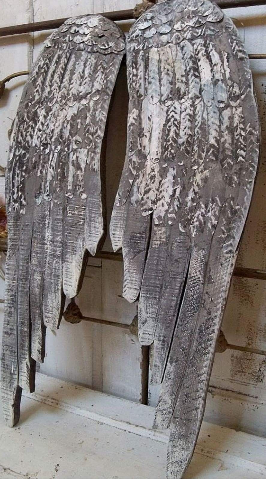 Large wooden angel wings wall sculpture