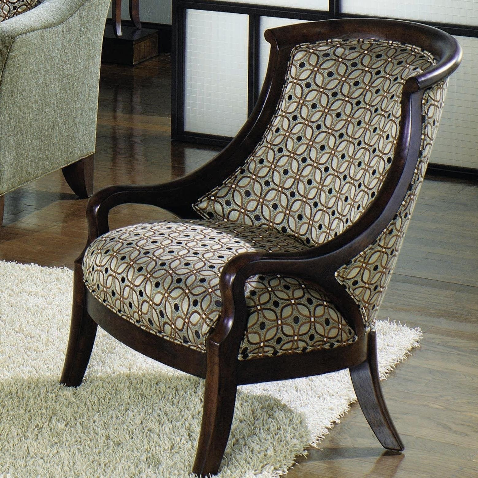 Contemporary upholstered barrel back exposed wood frame arm chair 1