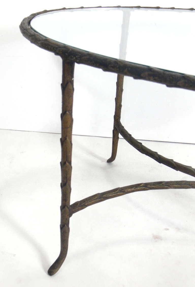 Oval bronze finish coffee table manner maison ramsay