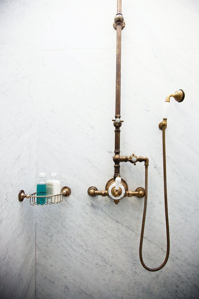 Antique brass shower head