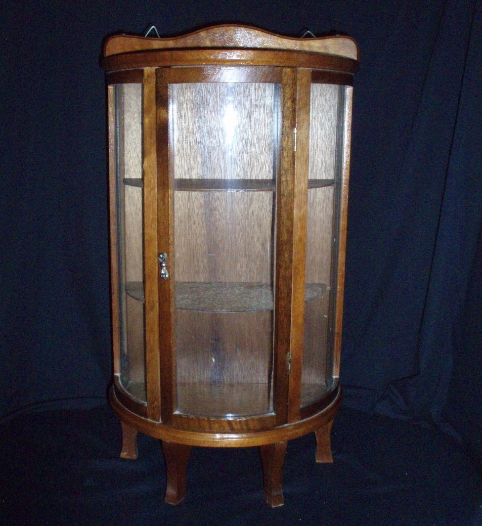 Antique glass curio cabinet