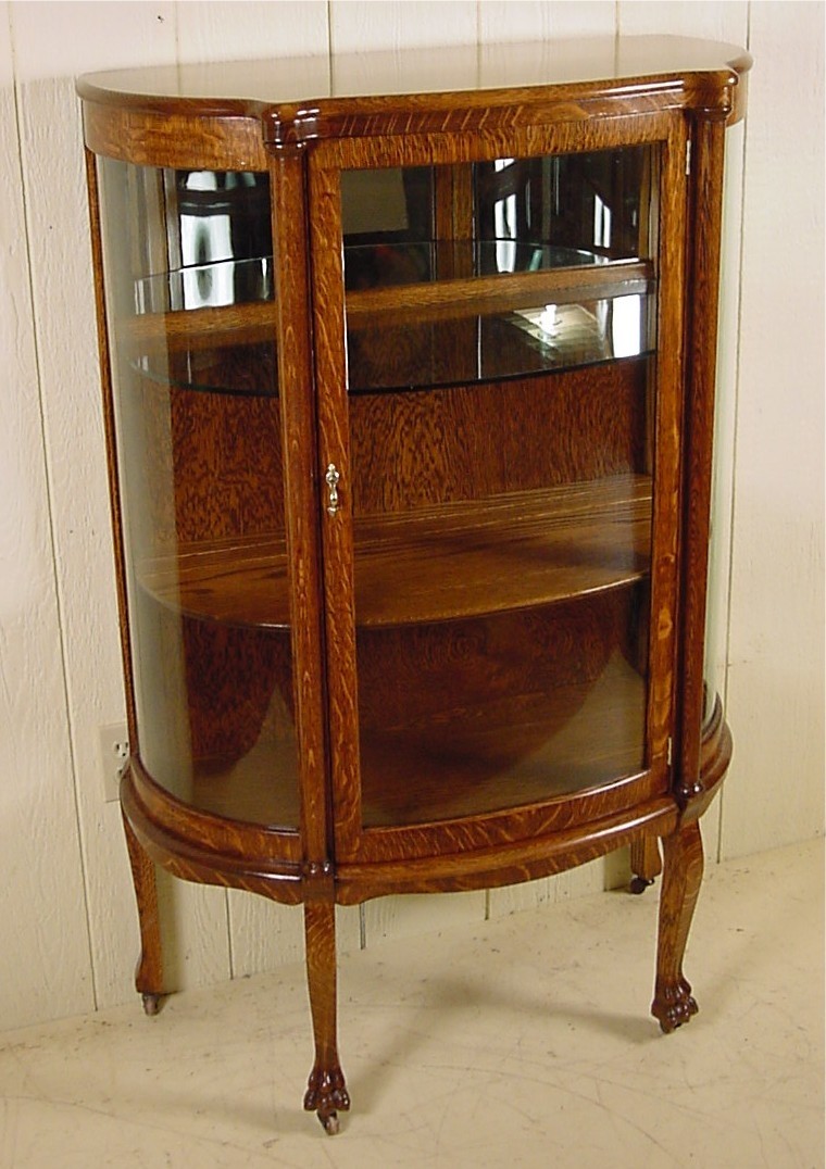 Small oak curio cabinet