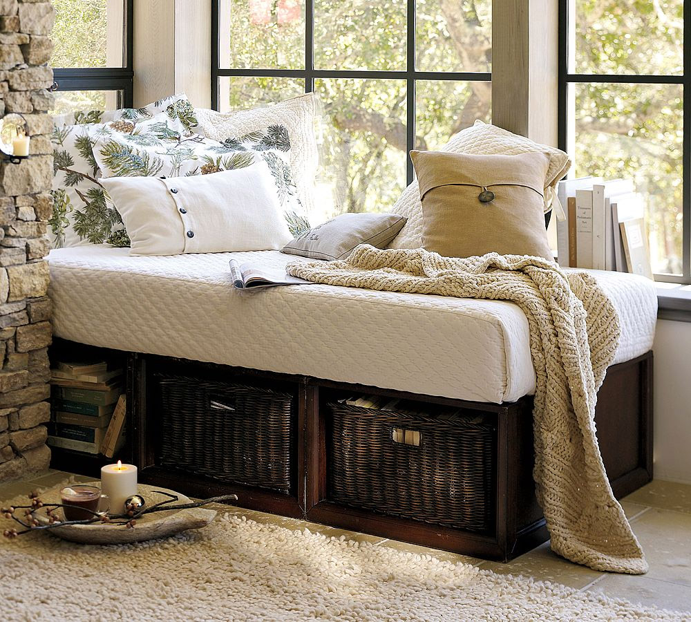 Sunroom reading nook with storage