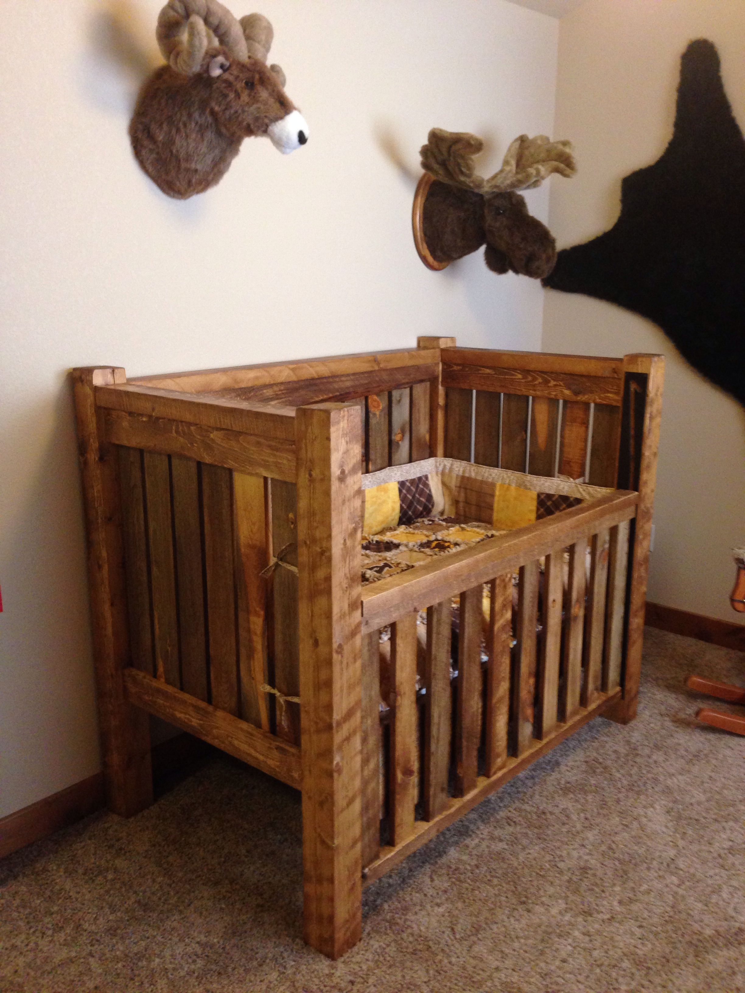 Rustic Natural Wood Baby Crib with Animal Wall Decor
