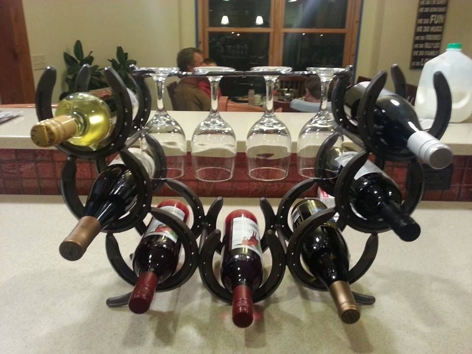 Horseshoe wine rack holds 7 bottles and