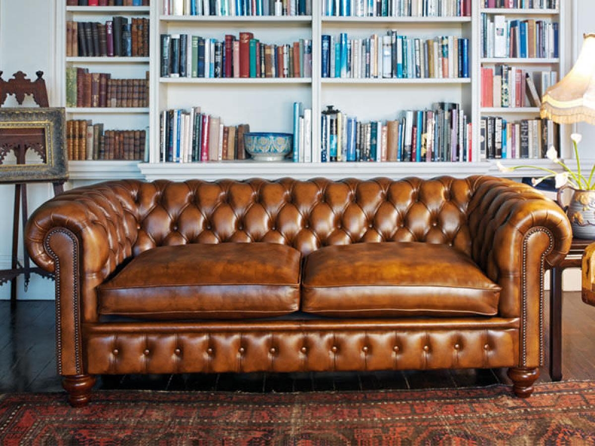 Leather camel back sofa 10