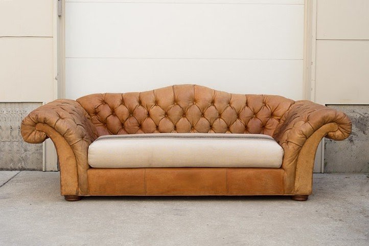 Vintage camel back sofa