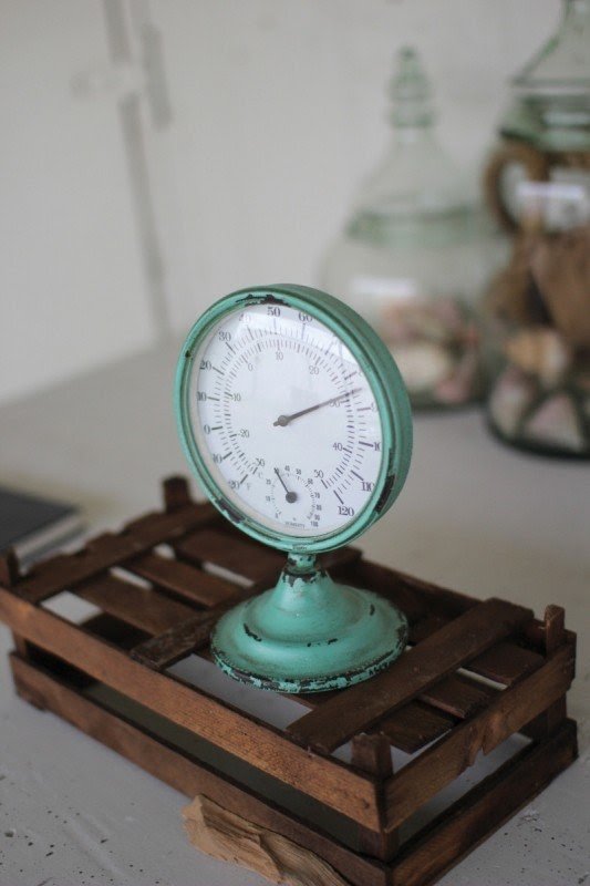 With its rustic finish and antique inspired shape this functional