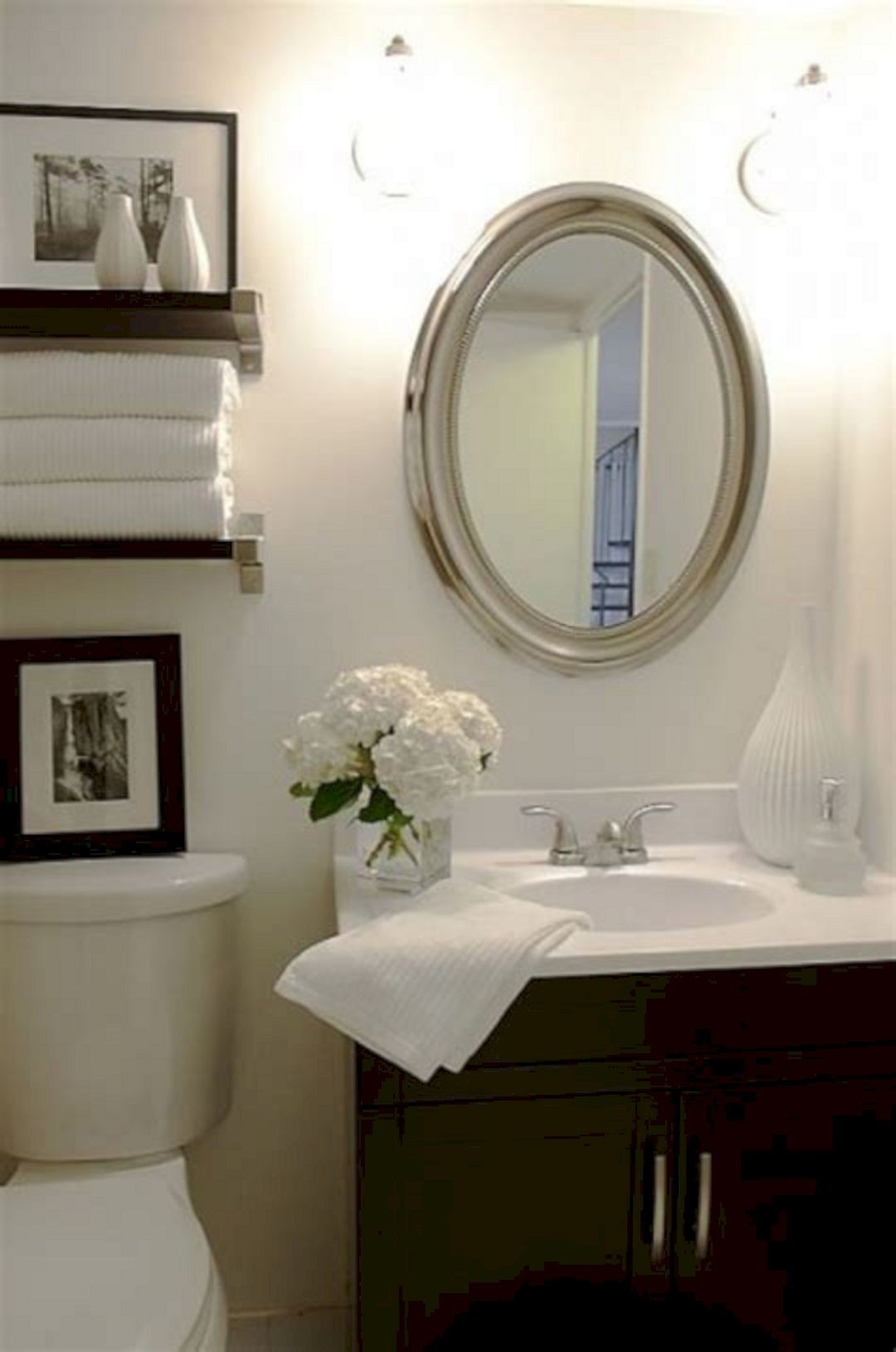 Floating shelves above toilet