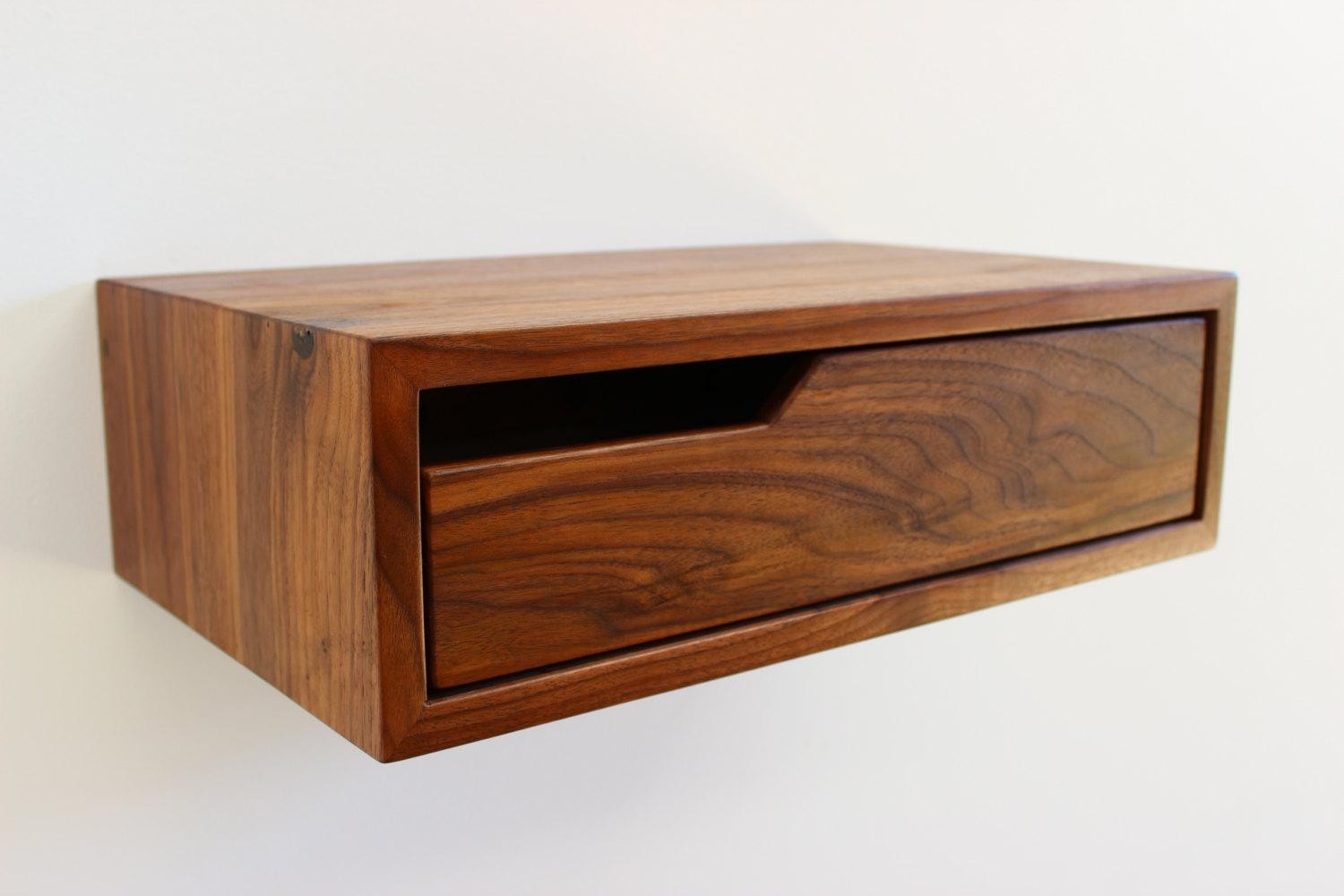 Solid walnut floating shelf with drawer space