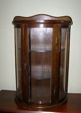 Vintage table top or wall hanging curved glass curio cabinet