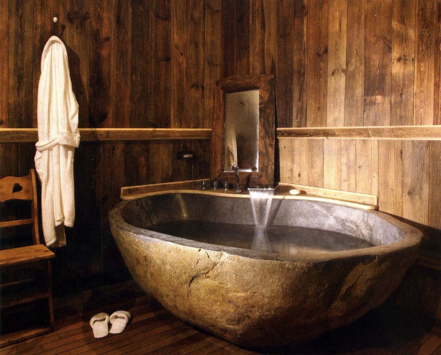That looks like natural stone for oval freestanding bathtub design