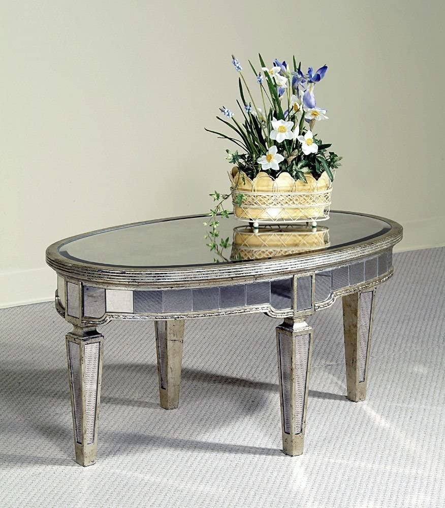 Oval antique mirrored coffee table
