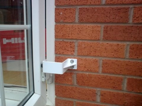 By patio doors blowing open when a patio doorstop is