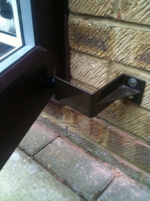 The above photographs of the angled doorstop in situ courtesy