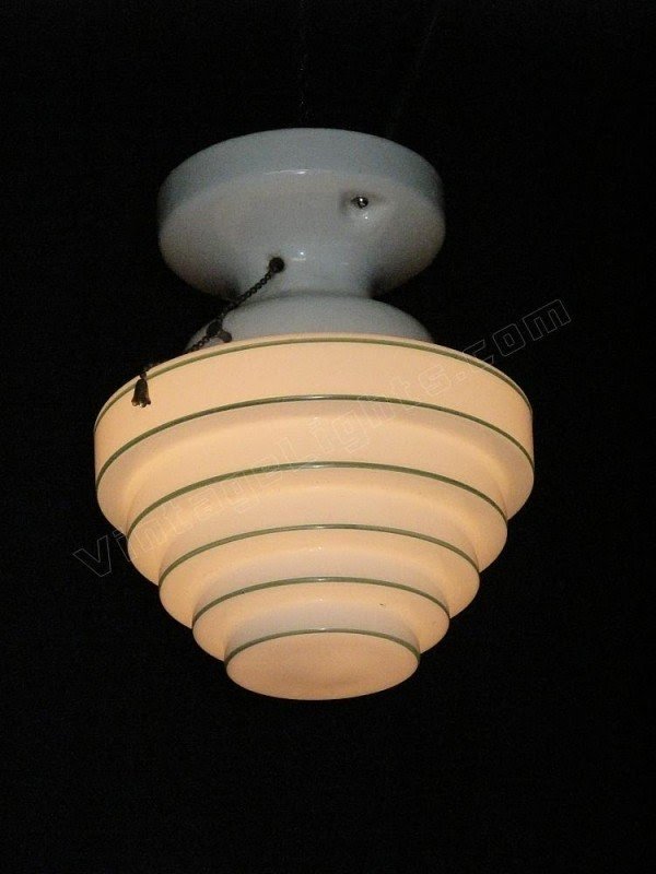 Vintage green striped beehive light fixture on porcelain fitter