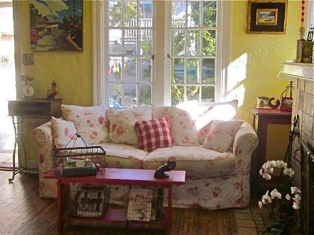 Shabby chic slipcovered sofa