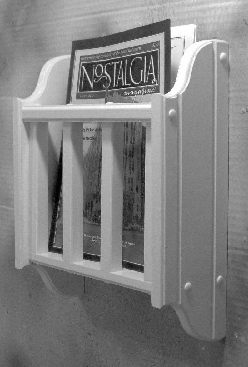 White magazine literature holder wall