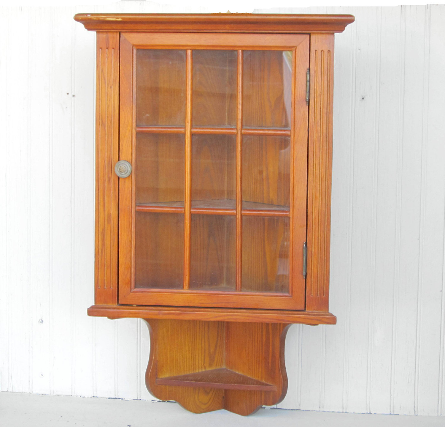 Corner wall curio cabinet