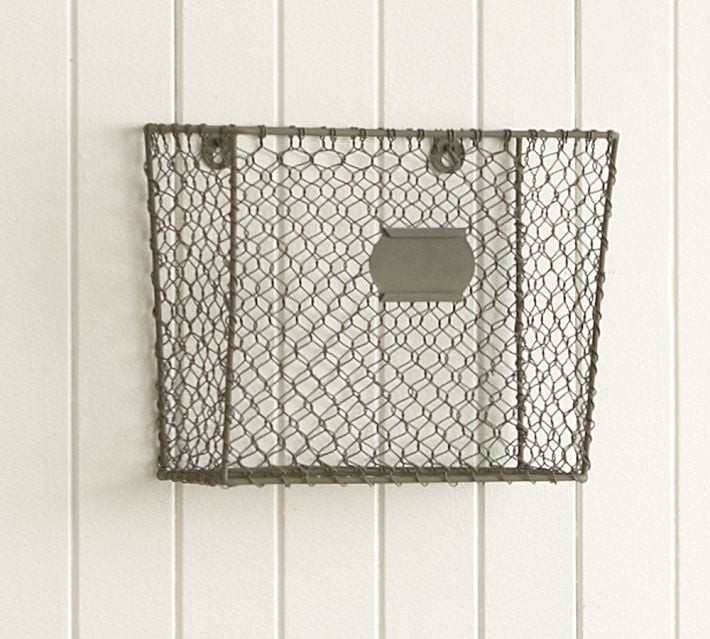 Wall mounted newspaper and magazine rack