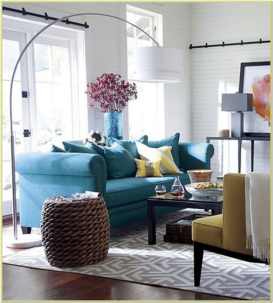 Behind the couch floor lamp