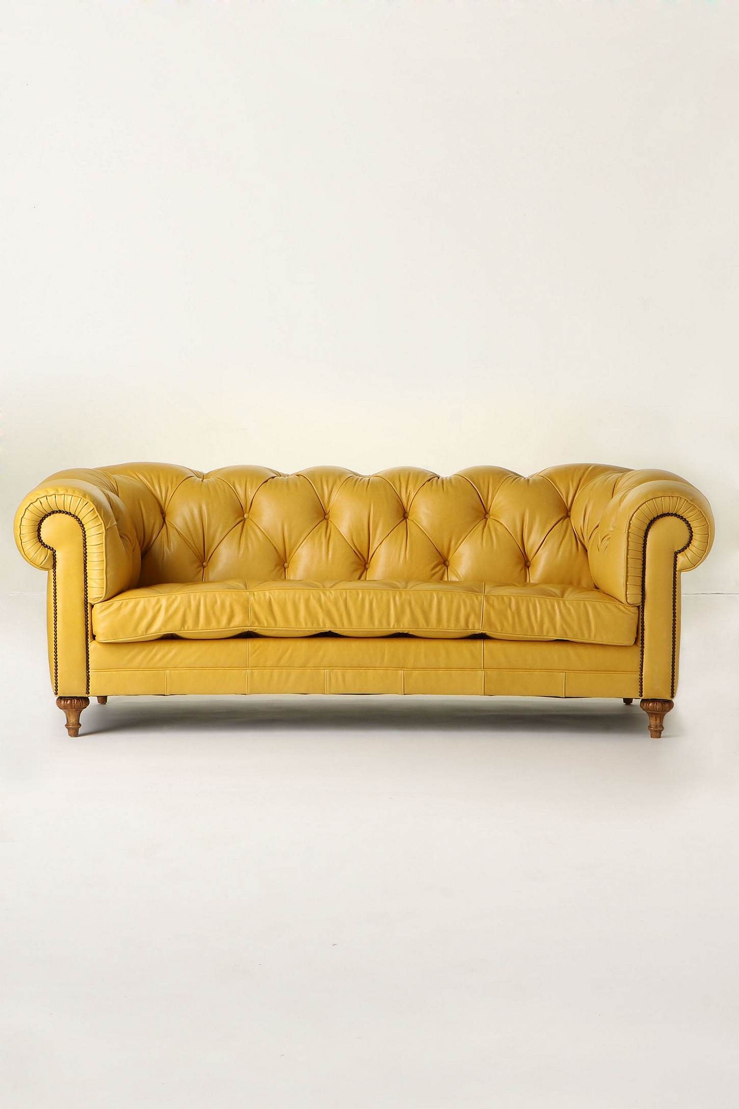 Pale yellow leather sofa