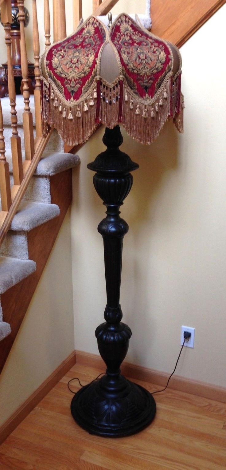 Victorian carved mahogany floor lamp with custom fabric shade