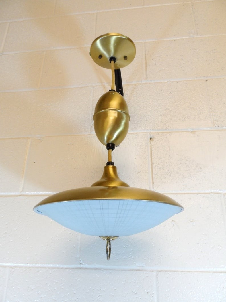 Mid century modern pull down reel light