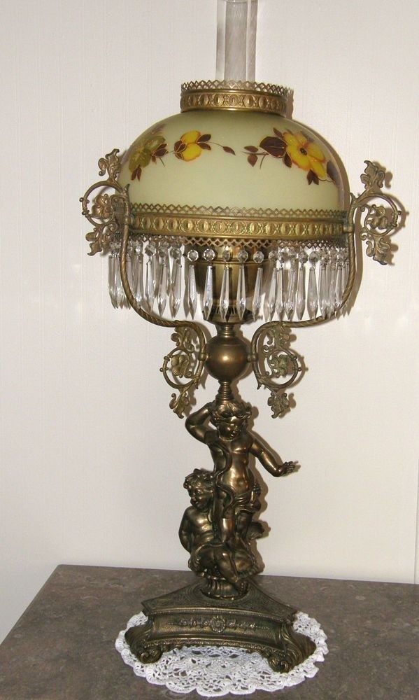 Antique victorian cherub kerosene lamp unique