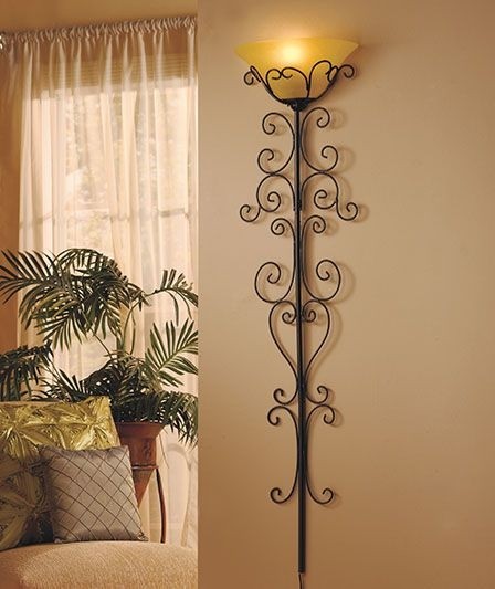 Scrolled wall lamp tucked out of the way and the