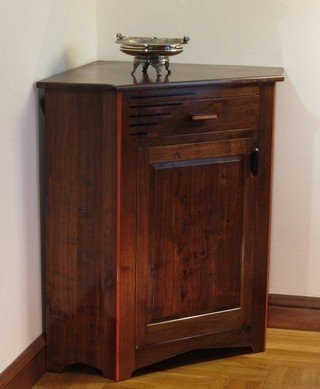 Triangular corner cabinet
